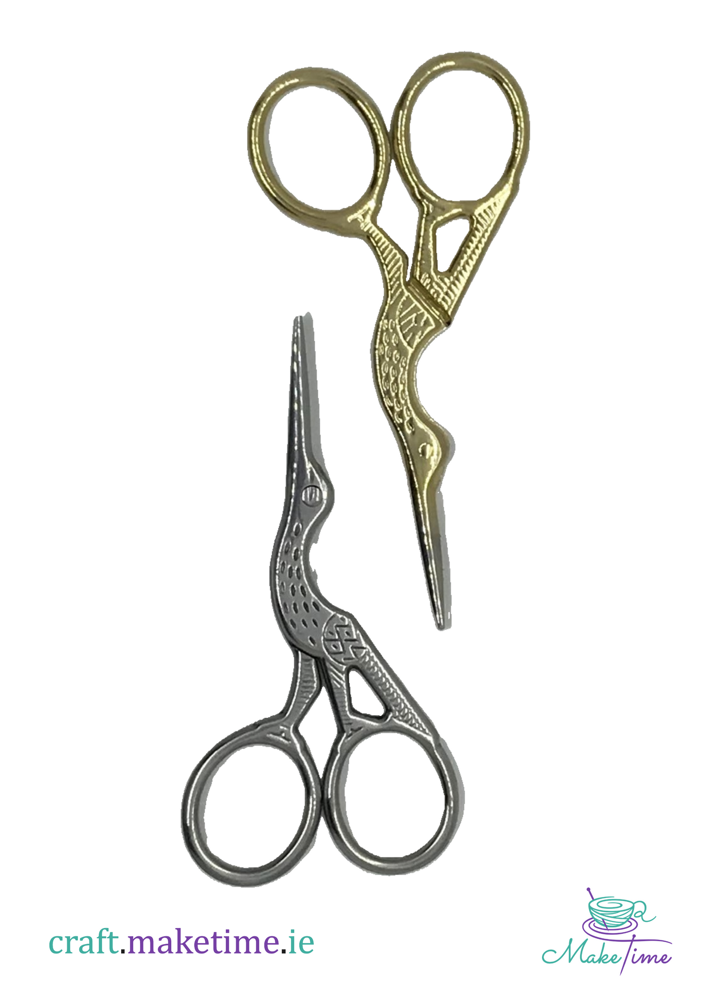 Pair of stork scissors with one gold and one silver design on a white background.