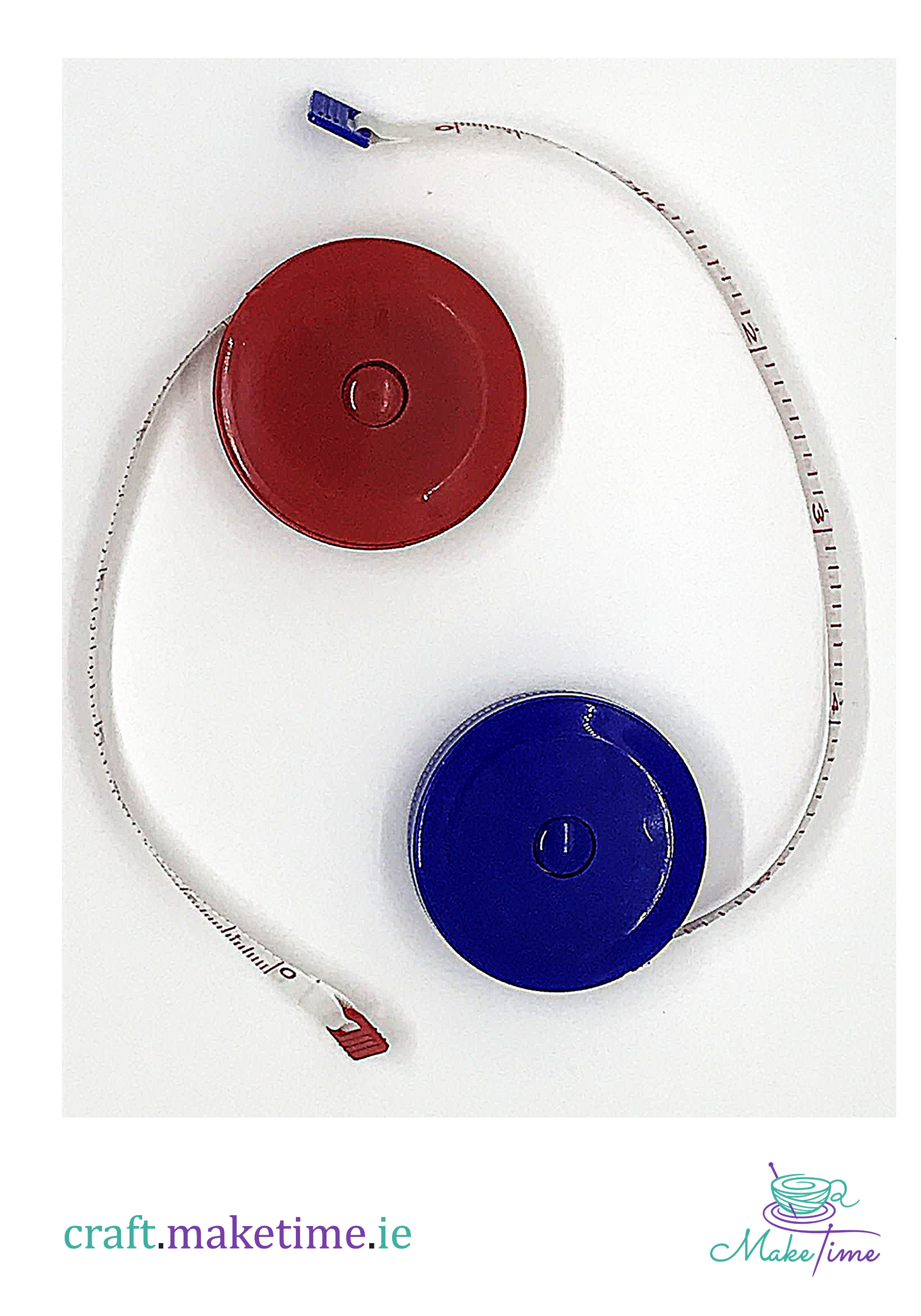 Retractable measuring tape with red and blue covers on a white background
